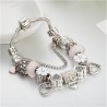 BRACELET WITH CRYSTAL HEART AND LOVE EUROPEAN CHARMS